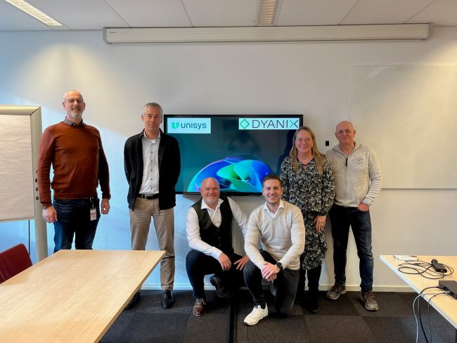 Bram van der Plas with consultants from Unisys Netherlands